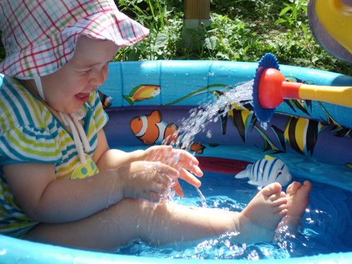 Papa mit der Blumengiesskanne